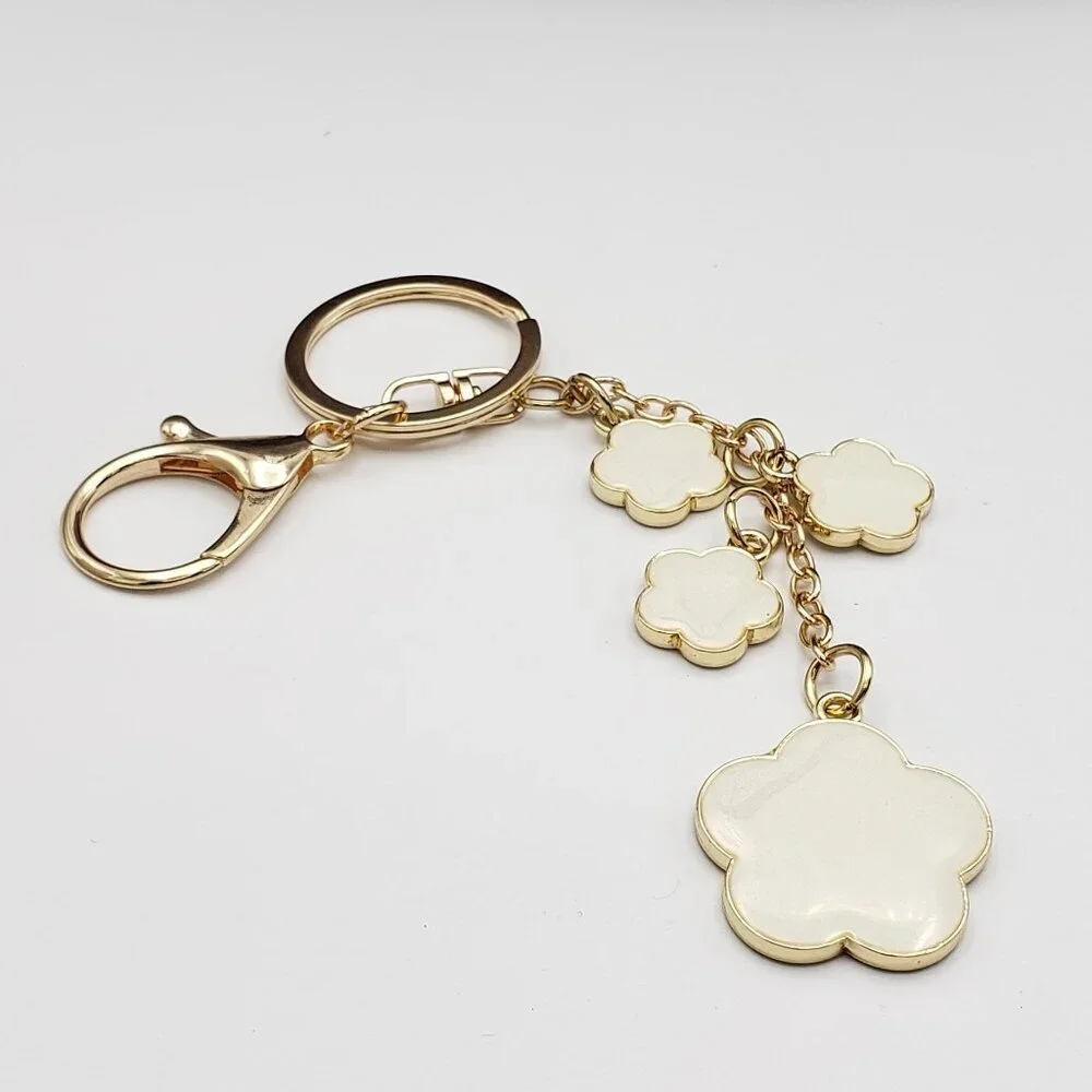 Authentic Louis Vuitton Lock & Key with Unbranded Flower Charm, Keychain